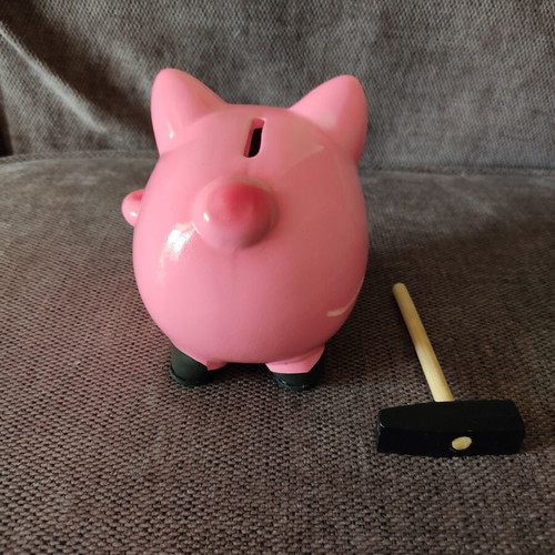 Ceramic piggy bank with hammer like new