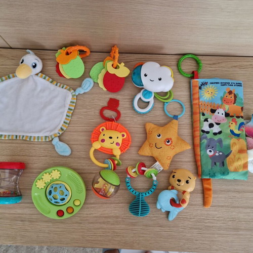 Baby toys like rattles, teethers and soft activity books, like new