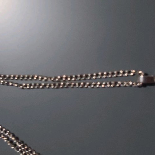Pendant necklace used with white rhinestones