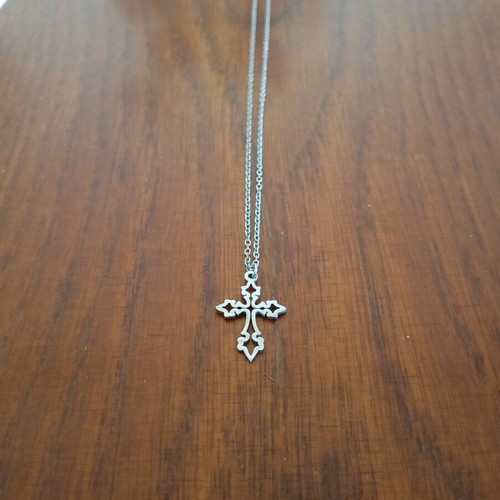 Steel cross like new, silver color