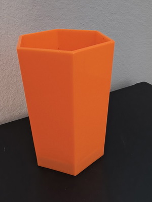 Hexagonal orange pencil holder like new, plastic