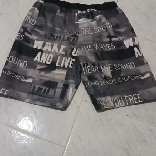 Joyce boys' swimwear size 12 like new, black and gray