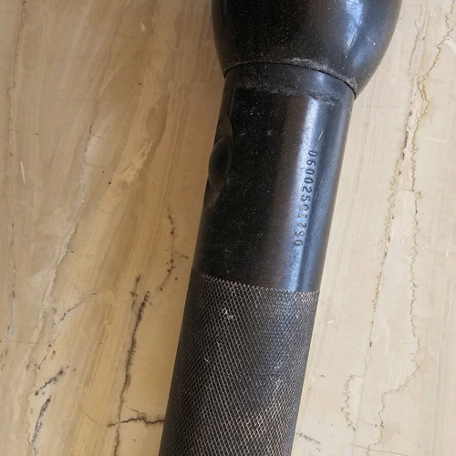 Flashlight used with swollen battery