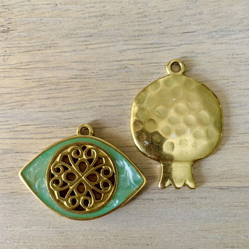 Gold-plated pendants with pomegranate and eye, new