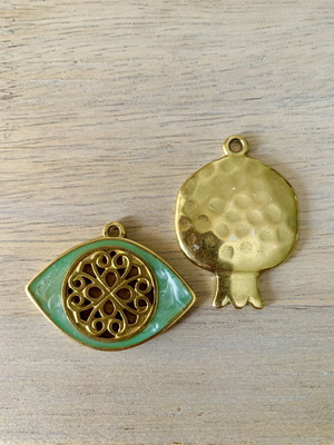Gold-plated pendants with pomegranate and eye, new