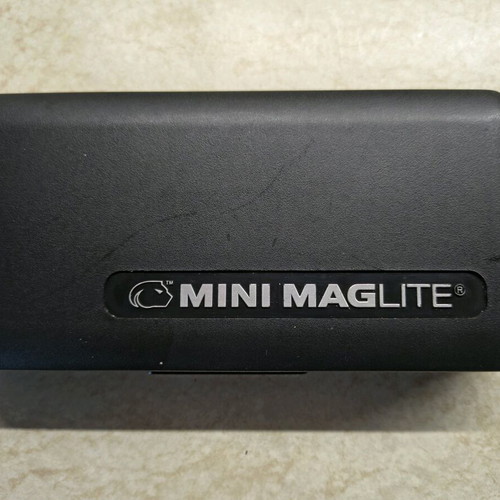 Mini Maglite flashlight used, metal with two batteries