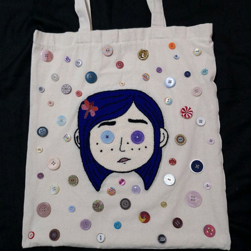 Handmade cotton shoulder bag with embroidered Coraline face and buttons beige