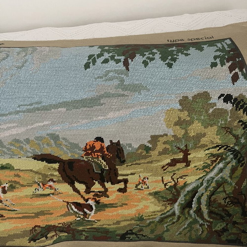 Handmade embroidered textile painting with classic hunting scene