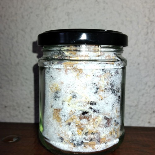 Handmade bath salts with rose petals and essential oils