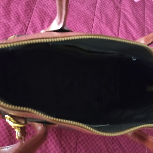 Leather bag medium size like new, black with brown details