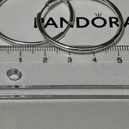 Pandora silver hoop earrings like new with engraved logo