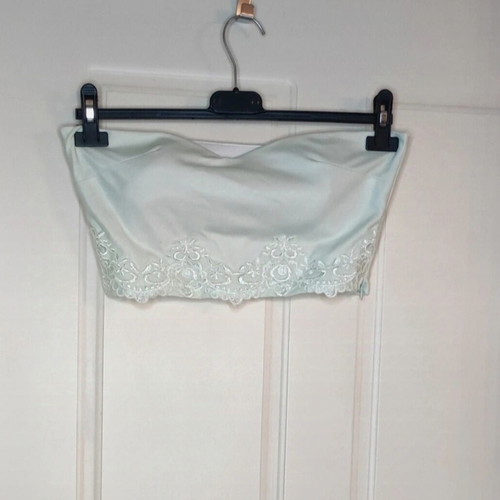 Women's clothing set used, turquoise with lace details