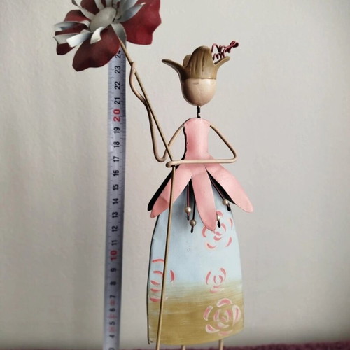 Metal decorative figurine like new with painted details