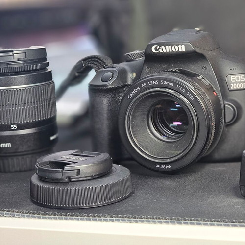 Canon EOS 2000D DSLR camera kit like new with 50mm f/1.8 STM and 18-55 IS lenses
