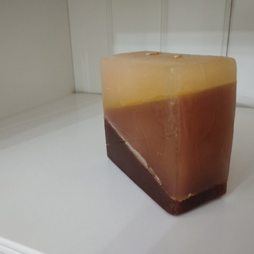 Handmade decorative candle used with layered minimal design