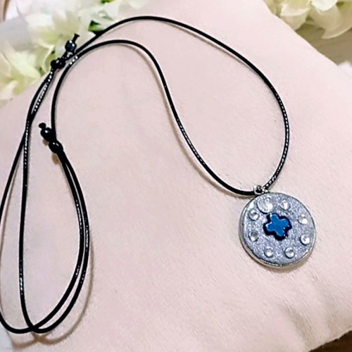 Handmade necklace with stainless steel iridescent silver motif and blue hematite cross