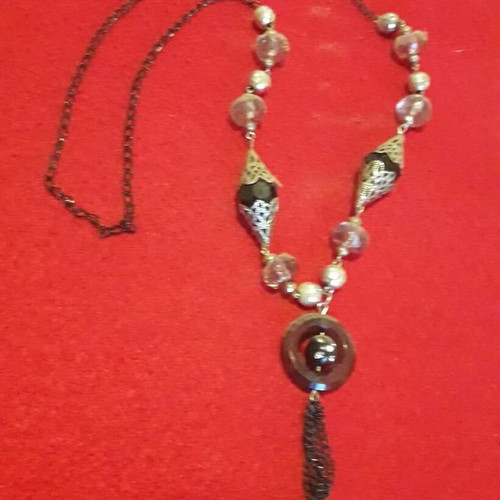 Long necklace like new with chain and decorative pendant