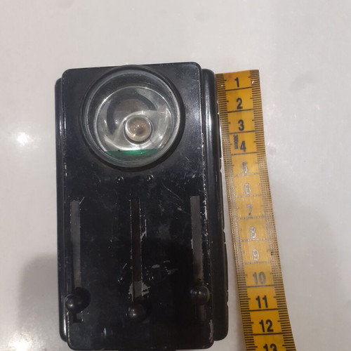 Artas soldier flashlight used, 1950s black with red and green filter
