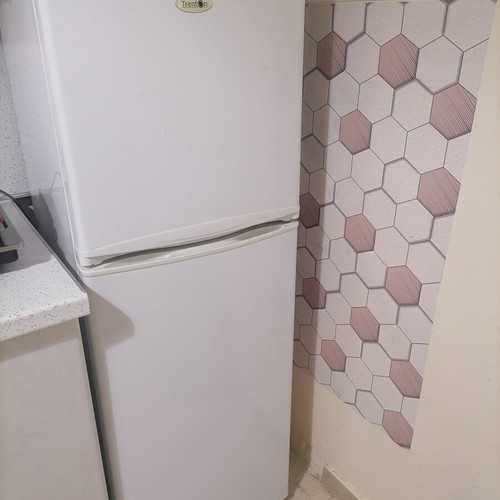 Trenton refrigerator like new, 140 cm height, 50 cm width