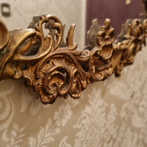 Rococo style wall mirror with gold embossed frame