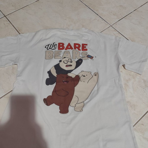 White short-sleeve T-shirt with figures size S like new