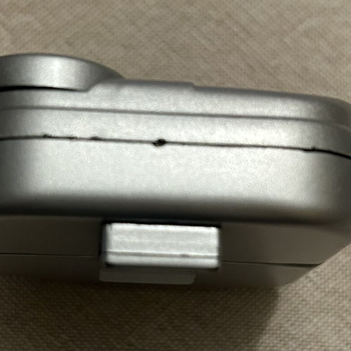 Pocket Radio with Headphones like new, silver color