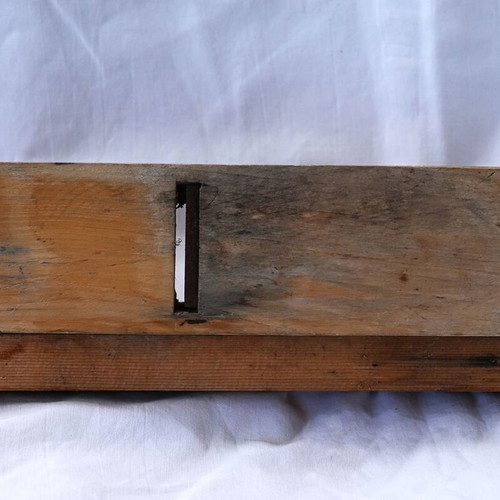Wooden plane used with horn handle and adjustable blade depth