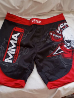 Venum MMA Extreme Fight shorts used, size XL, black and red