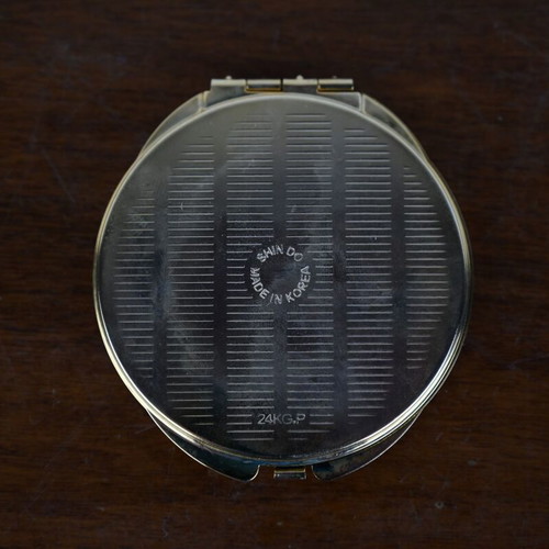 Vintage compact mirror with gold metal case like new
