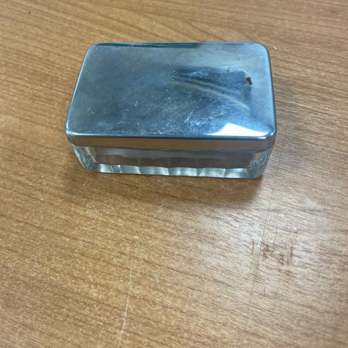 Glass syringe with used metal needle from 1952