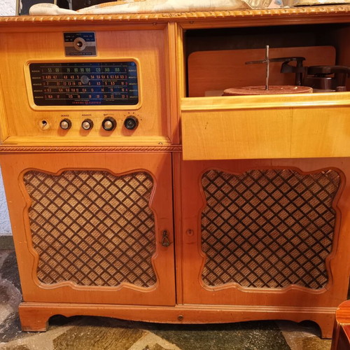 Cabinet with built-in turntable and radio used