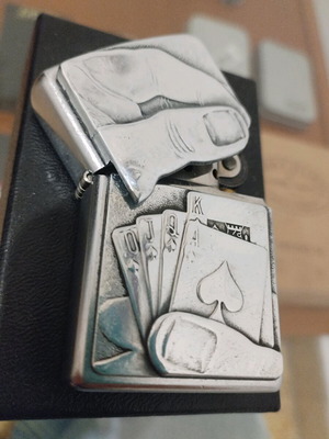 Zippo 2007 lighter used with embossed weight design