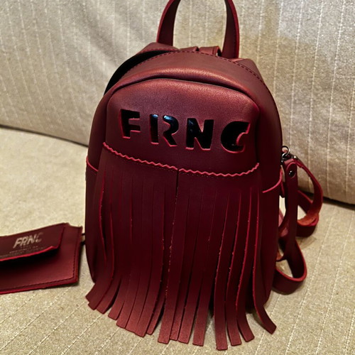 FRNC Backpack like new, burgundy with fringes and detachable wallet
