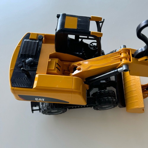 Bruder CAT Excavator used with wheels and shovel