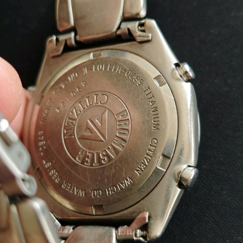 Citizen titanium Promaster watch men used, non operational, wr 100, model 6870-H11101