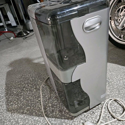 Singer 2100LCD dehumidifier used with filter and ionizer
