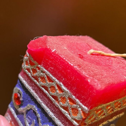Indian decorative candle used with imperfections due to age