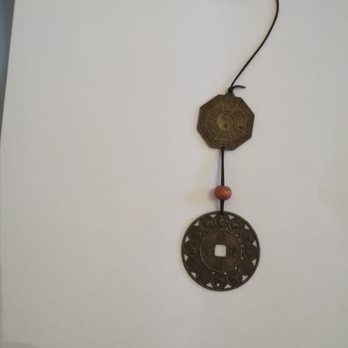 Melodos made of wood and metal with painted ideograms and Chinese zodiac new