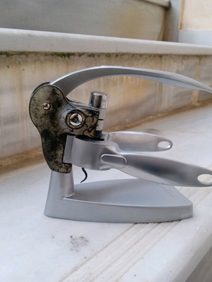 Tabletop inox corkscrew used with inox base