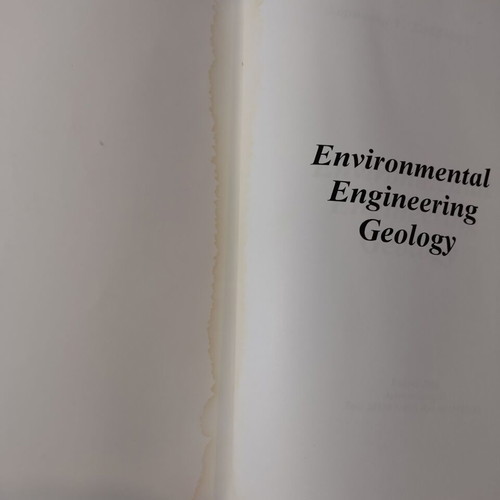 Environmental Engineering Geology book used with moisture marks
