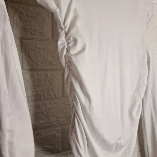 White turtleneck blouse like new with side gathers size M