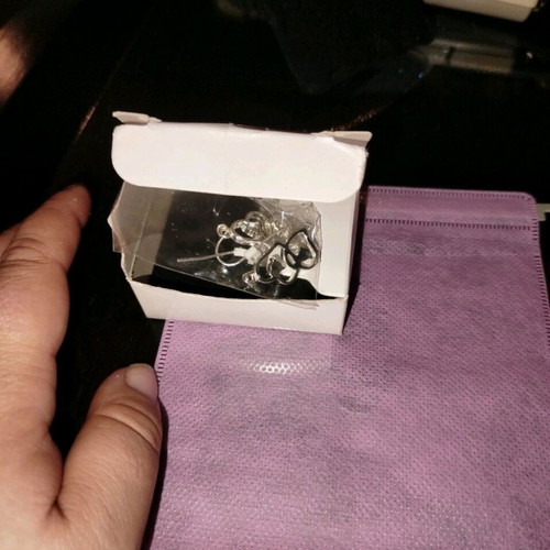 Avon heart dangle earrings new, surgical steel, silver color