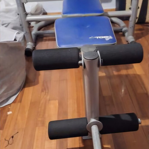 Fitness multi-gym like new with 2 discs 10kg and 2 discs 5kg