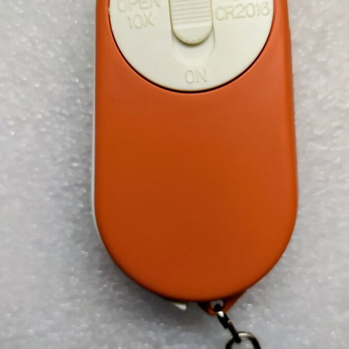 Orange BMW keychain with compass, magnifier, led and key case new