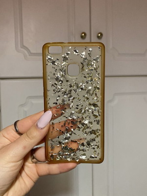 Clear phone case used with glitter