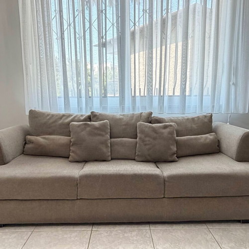 Three-seater fabric sofa in beige-grey