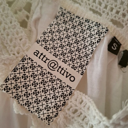 Attrattivo white sleeveless blouse used, knitted details