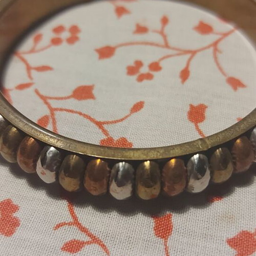 Bracelet used with bronze base and silver-bronze-gold tricolor