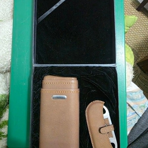 Luxury cigar accessory set with leather case and cutter