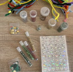 Craft materials and glitter set with stickers, pipe cleaners, beads